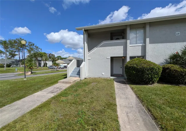 Photo 3 of Condo for sale at 5613 Blue Shadows Ct #60-2, Orlando, FL 32811 | MLS# O6416784 | Listing updated on 2026-09-03