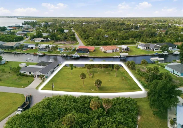 Photo 1 of Land for sale at 12397 & 12405 Mitchell Ter, Port Charlotte, FL 33981 | MLS# C7527333 | Listing updated on 2026-07-14
