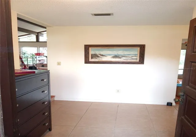 Photo 3 of Single family home for sale at 8136 NW 5th Court, Gainesville, FL 32607 | MLS# R4911452 | Listing updated on 2026-08-12
