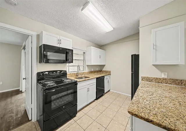 Photo 2 of Townhouse for sale at 1188 Woodman Way, Orlando, FL 32818 | MLS# O6416917 | Listing updated on 2026-09-25