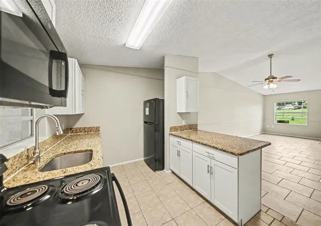 Photo 3 of Townhouse for sale at 1188 Woodman Way, Orlando, FL 32818 | MLS# O6416917 | Listing updated on 2026-09-25