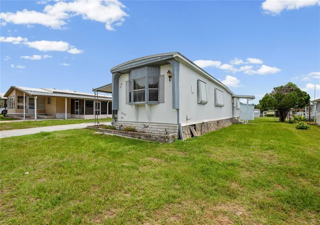 Photo 2 of Manufactured home for sale at 3834 Sarah Dr, Wesley Chapel, FL 33543 | MLS# TB8519356 | Listing updated on 2026-09-19