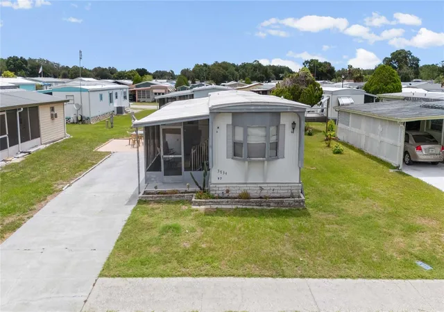 Photo 3 of Manufactured home for sale at 3834 Sarah Dr, Wesley Chapel, FL 33543 | MLS# TB8519356 | Listing updated on 2026-09-19