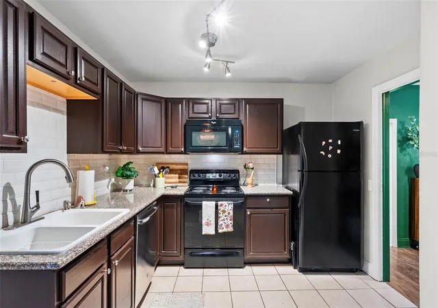 Photo 4 of Single family home for sale at 2016 E Powhatan Ave, Tampa, FL 33610 | MLS# TB8519379 | Listing updated on 2026-09-02