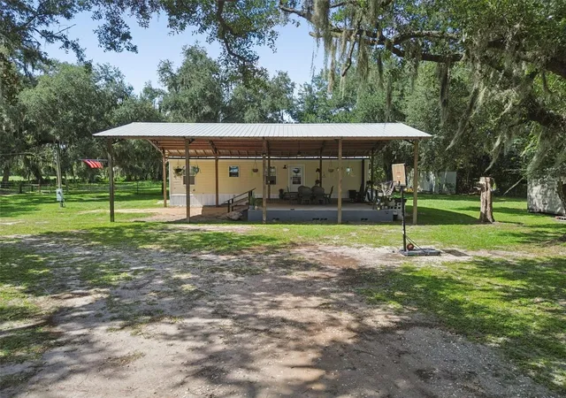 1st image of 4920 W Knights Griffin Rd, Plant City, FL 33565 | MLS# TB8519604