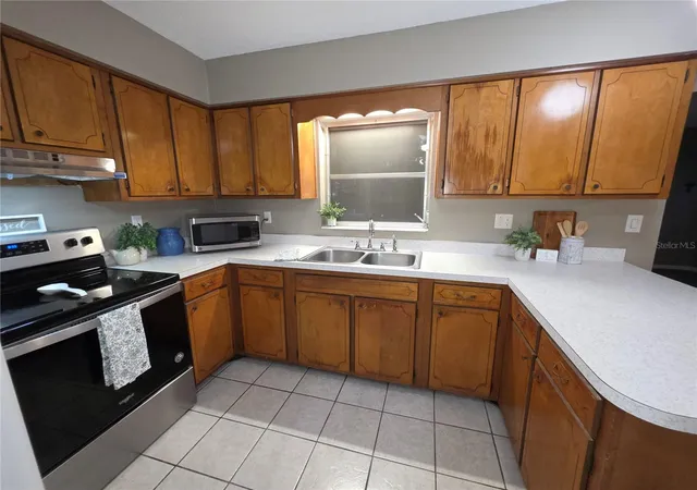 Photo 3 of Single family home for sale at 21654 Sw Raintree St, Dunnellon, FL 34431 | MLS# OM726715 | Listing updated on 2026-09-23