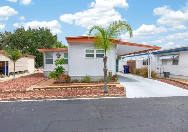 Photo 3 of Manufactured home for sale at 3527 Tiki Dr, Holiday, FL 34691 | MLS# TB8519648 | Listing updated on 2026-07-30