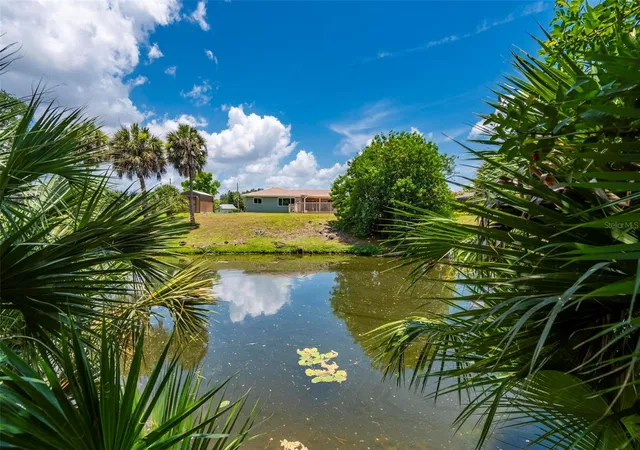 Photo 1 of Single family home for sale at 21358 Burkhart Dr, Port Charlotte, FL 33952 | MLS# C7527397 | Listing updated on 2026-09-15