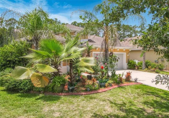 Photo 2 of Single family home for sale at 111 S Hummingbird Pl, Palm Coast, FL 32164 | MLS# FC319310 | Listing updated on 2026-09-05