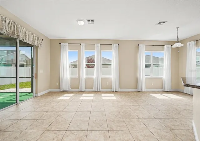 Photo 3 of Single family home for sale at 7614 Atwood Dr, Wesley Chapel, FL 33545 | MLS# TB8519798 | Listing updated on 2026-08-21