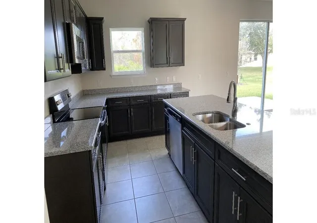 Photo 3 of Single family home for sale at 7050 Beckwith Ave, North Port, FL 34291 | MLS# OM726769 | Listing updated on 2026-07-01