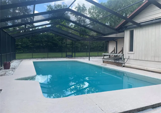 Photo 2 of Single family home for sale at 2421 Nw 106th Drive, Gainesville, FL 32606 | MLS# GC541264 | Listing updated on 2026-09-22