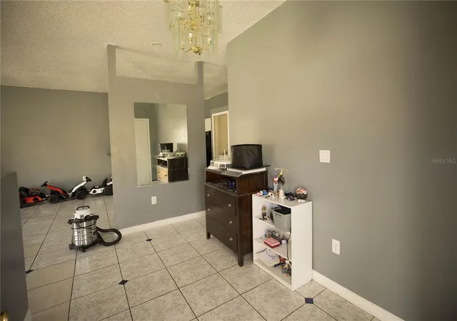 Photo 3 of Townhouse for sale at 1055 Universal Rest Pl, Kissimmee, FL 34744 | MLS# S5152039 | Listing updated on 2026-09-01