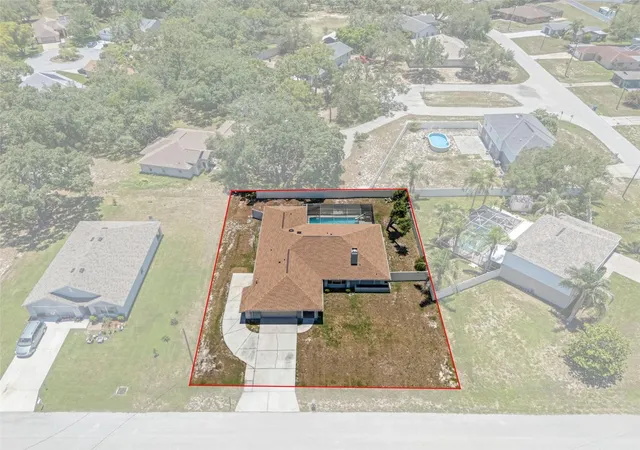 Photo 2 of Single family home for sale at 7376 Skylark Dr, Spring Hill, FL 34606 | MLS# W7886807 | Listing updated on 2026-10-01