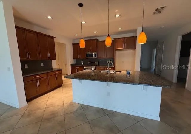 Photo 3 of Sale Pending at 1284 Bonita Cyn Dr, Kissimmee, FL 34759 | MLS# S5152050 | Listing updated on 2026-07-16