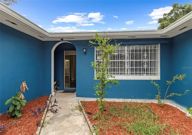 Photo 2 of Single family home for sale at 1700 Needlewood Ln, Orlando, FL 32818 | MLS# O6417629 | Listing updated on 2026-10-07