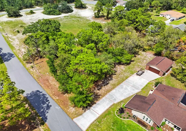 3rd image of 1228 Staten Ave, Spring Hill, FL 34609 | MLS# W7886812