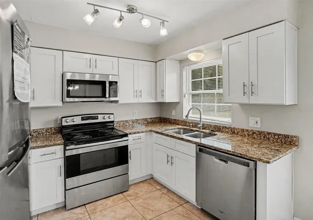 Photo 3 of Single family home for sale at 3255 Kelvington Dr, Orlando, FL 32810 | MLS# O6417658 | Listing updated on 2026-08-06