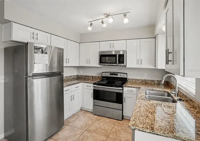 Photo 4 of Single family home for sale at 3255 Kelvington Dr, Orlando, FL 32810 | MLS# O6417658 | Listing updated on 2026-08-06