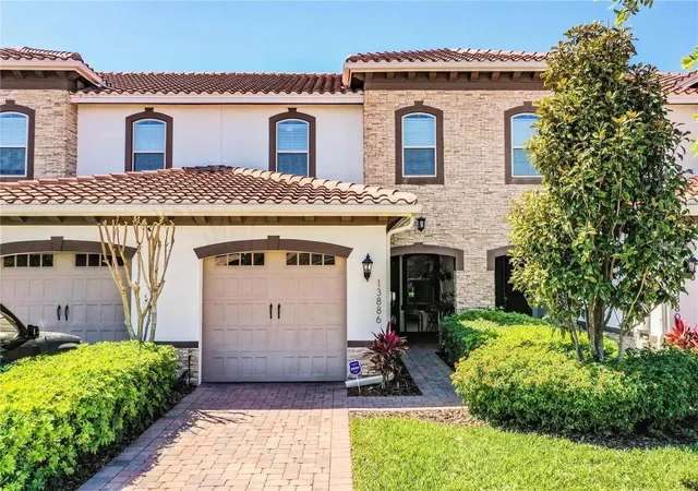 Photo 1 of Townhouse for sale at 13886 Arclid St, Orlando, FL 32832 | MLS# O6417665 | Listing updated on 2026-09-23