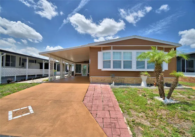 Photo 1 of Manufactured home for sale at 4146 Sprucewood St, Winter Haven, FL 33880 | MLS# P4939076 | Listing updated on 2026-06-21