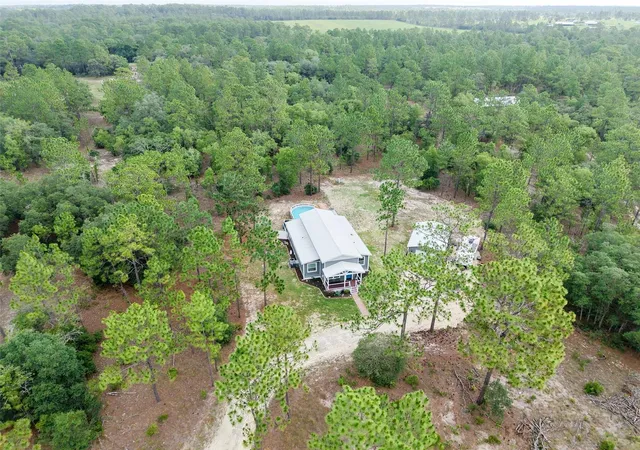 Photo 1 of Single family home for sale at 13971 Se 82nd Lane, Dunnellon, FL 34431 | MLS# OM726829 | Listing updated on 2026-09-19