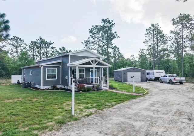 Photo 2 of Single family home for sale at 13971 Se 82nd Lane, Dunnellon, FL 34431 | MLS# OM726829 | Listing updated on 2026-09-19