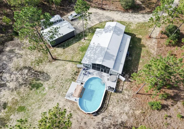 Photo 3 of Single family home for sale at 13971 Se 82nd Lane, Dunnellon, FL 34431 | MLS# OM726829 | Listing updated on 2026-09-19