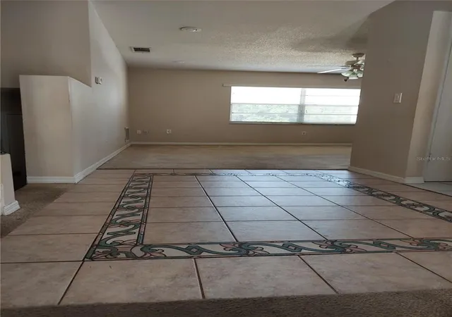 Photo 3 of Single family home for sale at 8139 Laurel Tree Dr, Orlando, FL 32819 | MLS# O6417714 | Listing updated on 2026-07-13