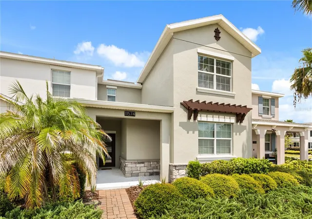 Photo 1 of Townhouse for sale at 11574 Comic Aly, Orlando, FL 32832 | MLS# O6417736 | Listing updated on 2026-09-07