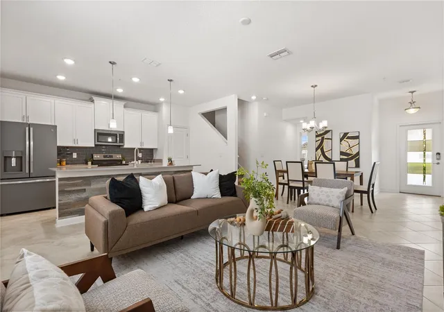 Photo 3 of Townhouse for sale at 11574 Comic Aly, Orlando, FL 32832 | MLS# O6417736 | Listing updated on 2026-09-07