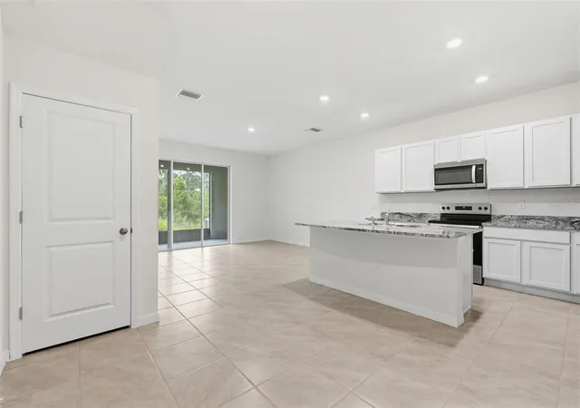 Photo 2 of Townhouse for sale at 5005 Gilded Bard Ct, Wimauma, FL 33598 | MLS# TB8520389 | Listing updated on 2026-09-23