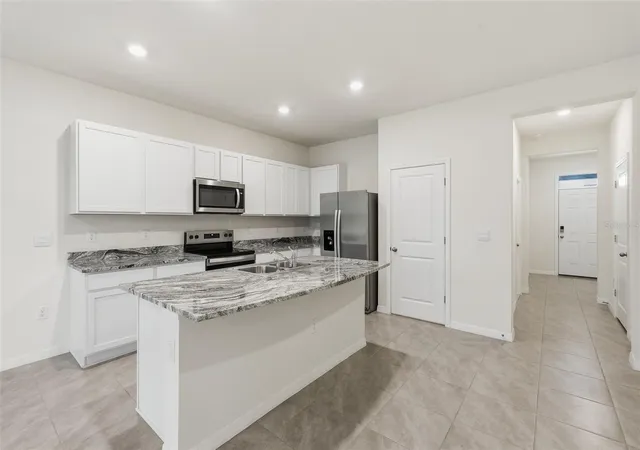 Photo 3 of Townhouse for sale at 5005 Gilded Bard Ct, Wimauma, FL 33598 | MLS# TB8520389 | Listing updated on 2026-09-23