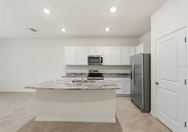 Photo 3 of Townhouse for sale at 5005 Gilded Bard Ct, Wimauma, FL 33598 | MLS# TB8520389 | Listing updated on 2026-09-23