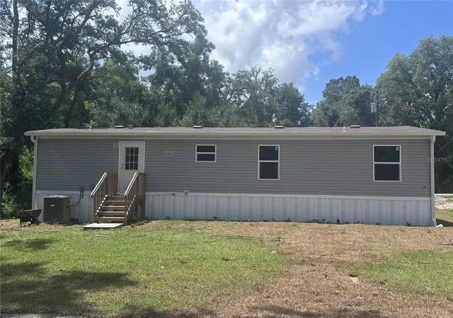 Photo 2 of Manufactured home for sale at 11801 Nw 20th Street, Ocala, FL 34482 | MLS# OM726883 | Listing updated on 2026-07-10