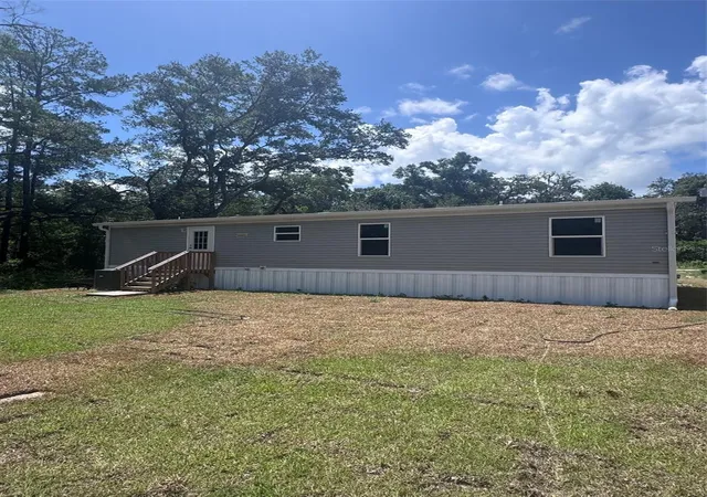 Photo 3 of Manufactured home for sale at 11801 Nw 20th Street, Ocala, FL 34482 | MLS# OM726883 | Listing updated on 2026-07-10