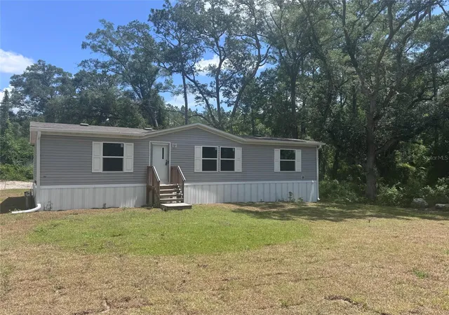 Photo 1 of Manufactured home for sale at 11801 Nw 20th Street, Ocala, FL 34482 | MLS# OM726883 | Listing updated on 2026-07-10
