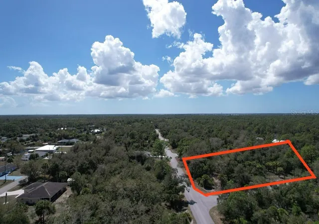 Photo 1 of Land for sale at 14319 Daniels Ave, Port Charlotte, FL 33953 | MLS# O6417877 | Listing updated on 2026-07-15