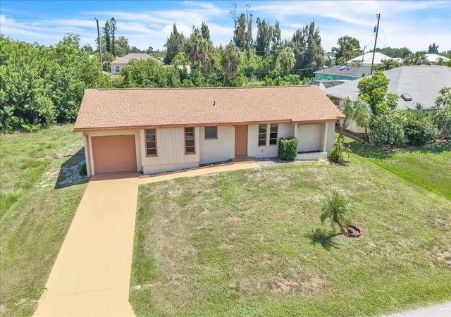 Photo 1 of Single family home for sale at 528 Magnolia Ave Nw, Port Charlotte, FL 33952 | MLS# C7527488 | Listing updated on 2026-09-01