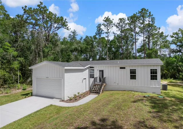 Photo 5 of Manufactured home for sale at 14249 E Razorbill Ave, Brooksville, FL 34614 | MLS# W7886843 | Listing updated on 2026-09-02