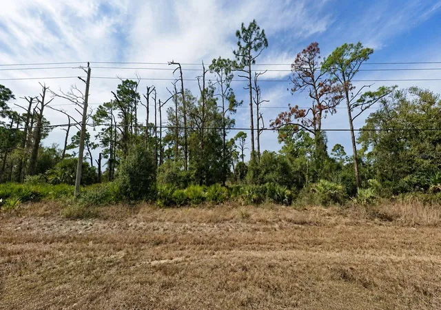 Photo 1 of Land for sale at 3255 Collingswood Blvd, Port Charlotte, FL 33948 | MLS# O6417941 | Listing updated on 2026-08-12