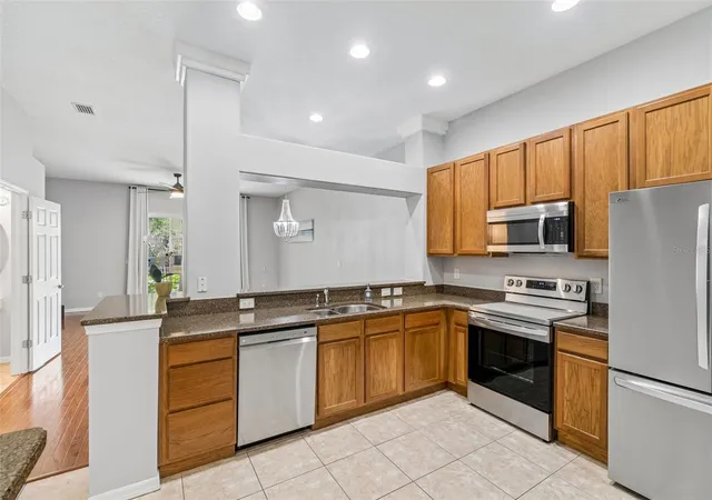Photo 3 of Townhouse for sale at 1455 Hidden Ct, Tarpon Springs, FL 34689 | MLS# TB8520602 | Listing updated on 2026-09-06