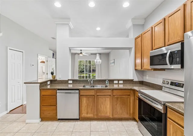 Photo 4 of Townhouse for sale at 1455 Hidden Ct, Tarpon Springs, FL 34689 | MLS# TB8520602 | Listing updated on 2026-09-06