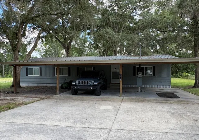 Photo 1 of Manufactured home for sale at 15190 Ne 144th Street, Fort Mc Coy, FL 32134 | MLS# OM726908 | Listing updated on 2026-09-21