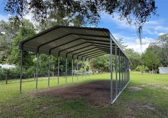 Photo 3 of Manufactured home for sale at 15190 NE 144th Street, Fort Mc Coy, FL 32134 | MLS# OM726908 | Listing updated on 2026-09-21