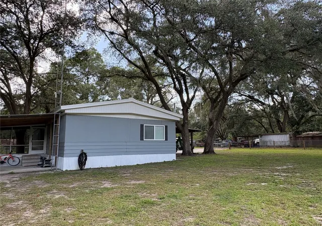 Photo 4 of Manufactured home for sale at 15190 NE 144th Street, Fort Mc Coy, FL 32134 | MLS# OM726908 | Listing updated on 2026-09-21