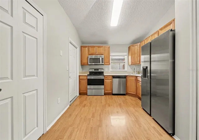 5th image of 1077 Sugarberry Trl, Oviedo, FL 32765 | MLS# O6418007