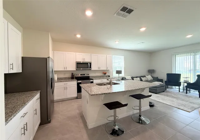 Photo 4 of Townhouse for sale at 1503 Isleta Loop, Kissimmee, FL 34741 | MLS# S5152119 | Listing updated on 2026-10-28