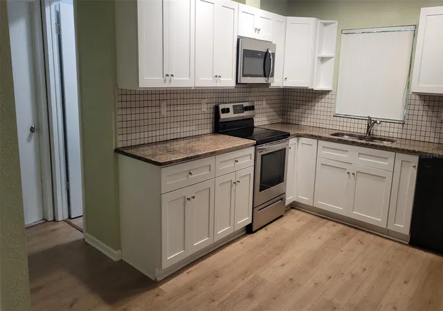 Photo 3 of Single family home for sale at 9080 Geneva St, Spring Hill, FL 34608 | MLS# W7886853 | Listing updated on 2026-10-08