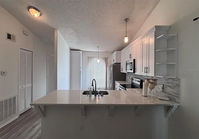 Photo 3 of Single family home for sale at 6518 Spring Land Ct, Orlando, FL 32818 | MLS# O6418060 | Listing updated on 2026-10-05